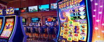Fitur bonus putaran gratis Wild Coaster dengan simbol scatter dan wild multiplier